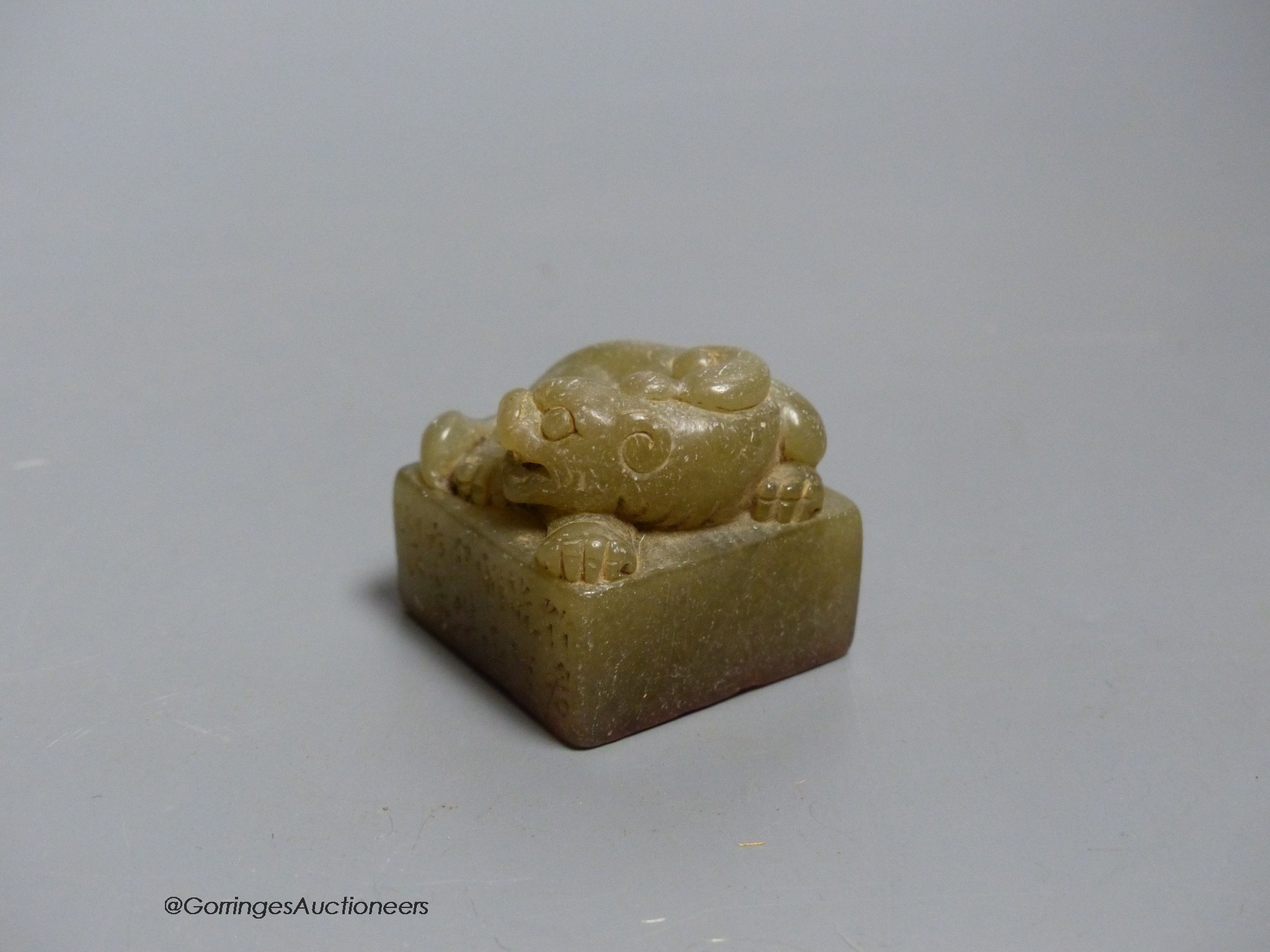 A Chinese carved soapstone 'lion-dog' seal, height 3.5cm